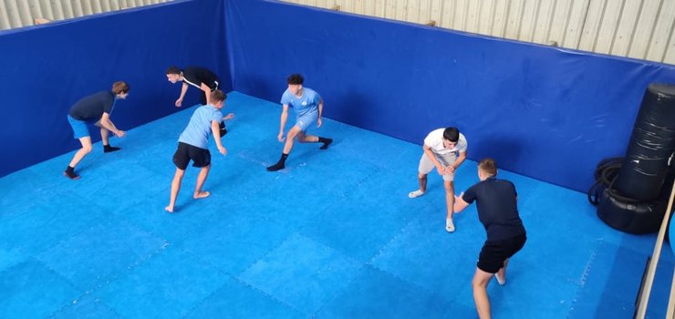 Image of City Football Coaching students learn MMA